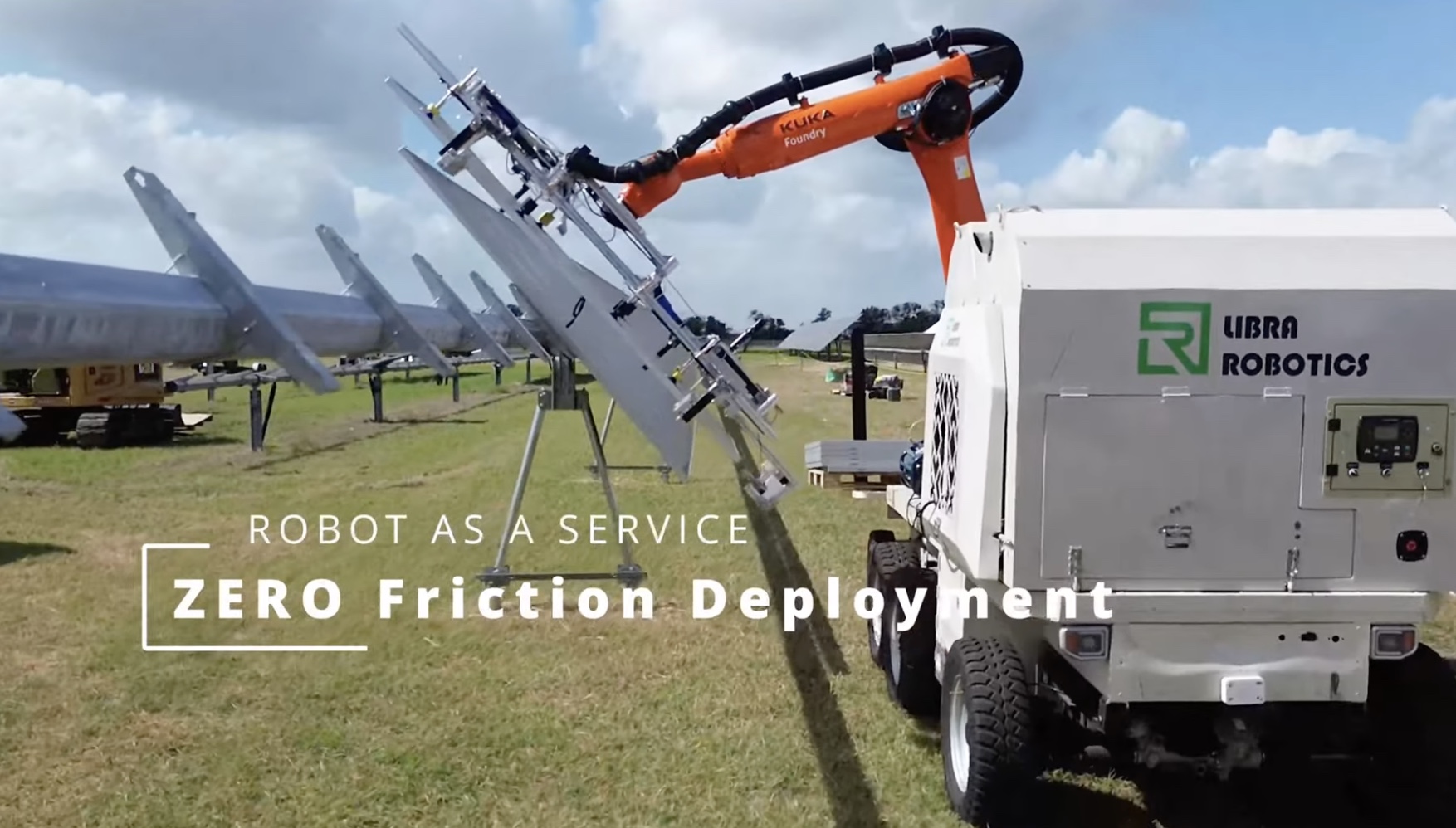 Rear view of a Libra Robotics solar installation robot working in the field